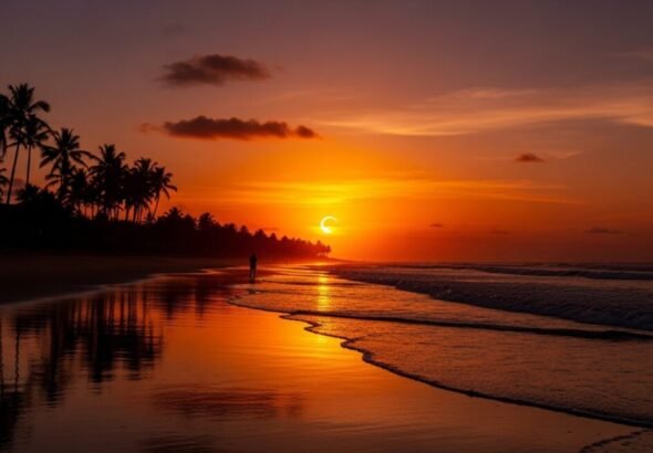 Recreación digital de un eclipse total visto desde una playa en el horizonte por el trío de eclipses.