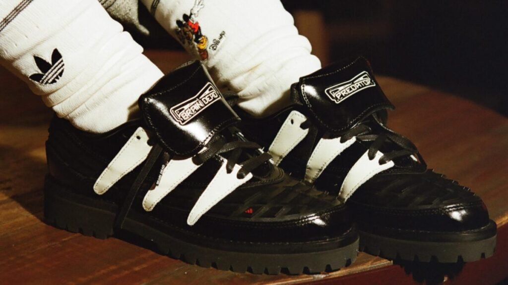 El calzado híbrido de adidas con Brain Dead que reimagina el fútbol de los 90 para la calle Imagen que muestra el rediseño de la nueva bota adidas Predator de 1994 en colaboración con Brain Dead y Disney